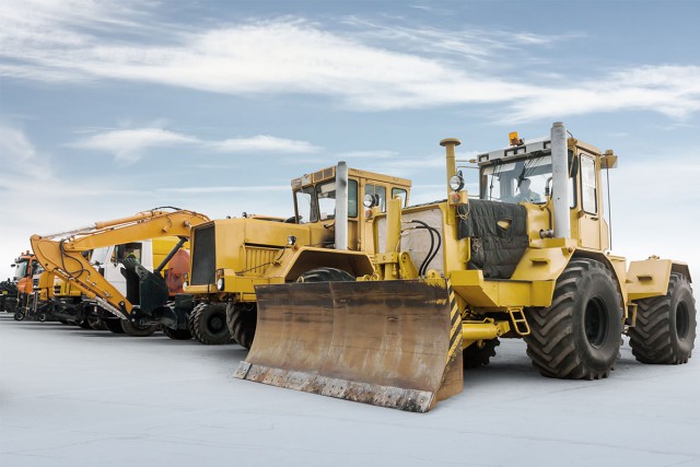 Yellow construction vehicles equipped for Heavy Duty Mount applications